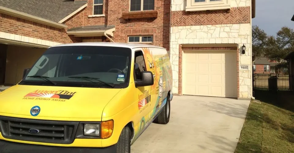 Amertint service van parked at a residential home in Lantanna Texas after a full home window tinting installation
